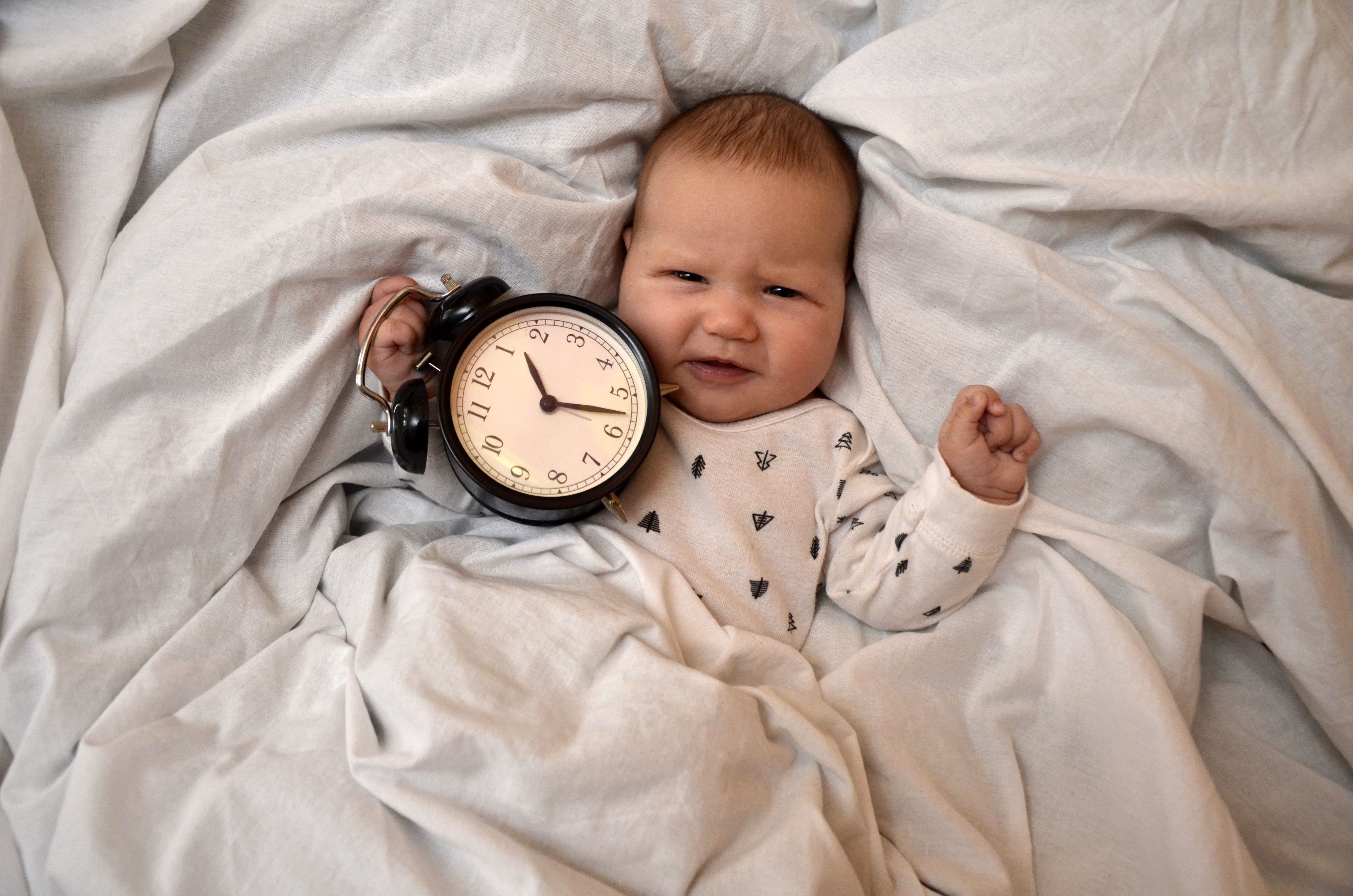 Baby and clock